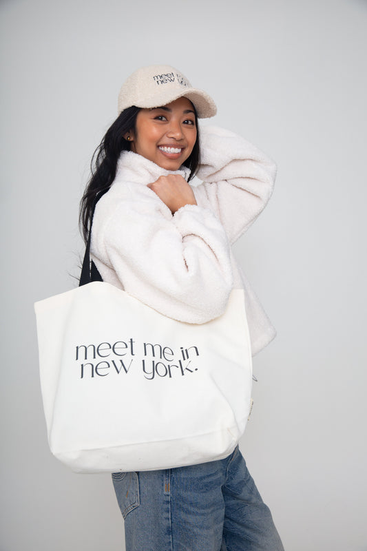 Meet Me in New York 16 oz Canvas Tote Bag by alchemy.